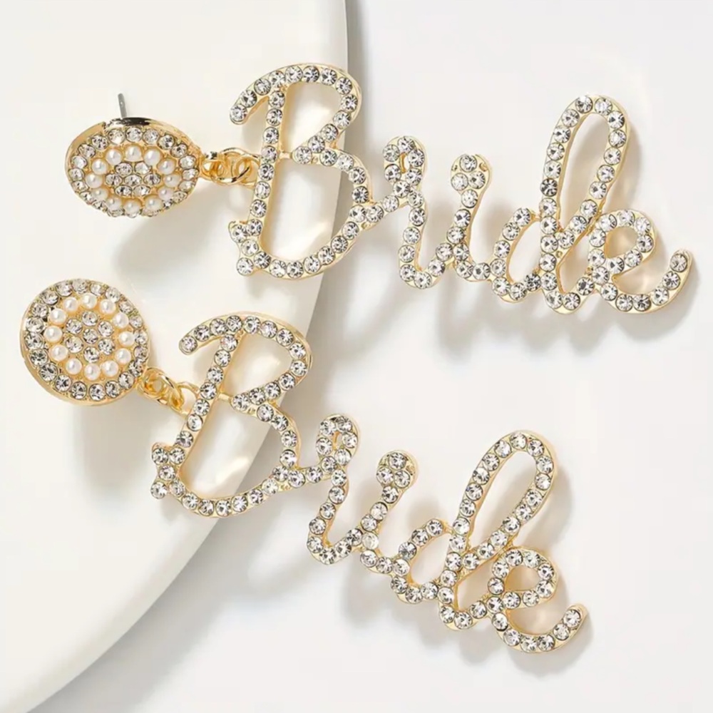 Bride rhinestone earrings.  3” x 1” shiny, not too heavy. NIP
